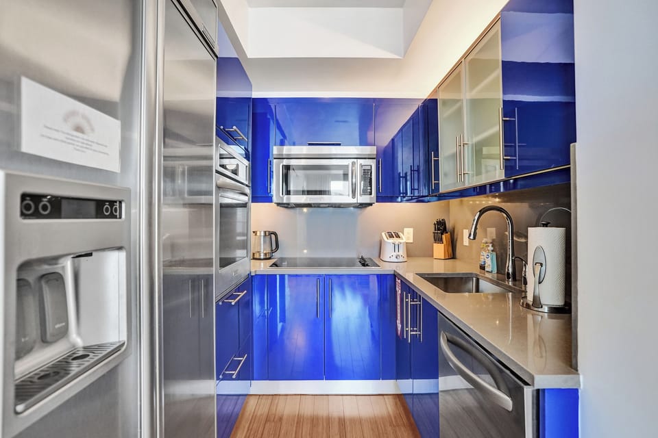 Well-equipped galley kitchen with modern appliances and plenty of counter space
