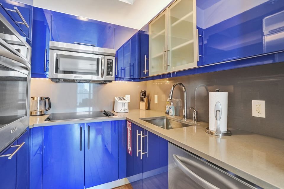 Prep, cook, and clean up easily with this streamlined, modern kitchen setup