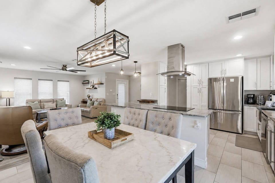 Share meals, celebrate special moments, or simply enjoy one another's company in this bright, open dining area designed for gathering.