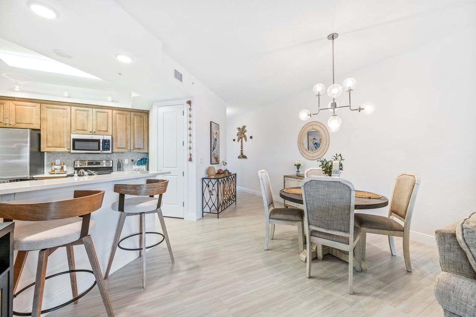 Enjoy meals together in this bright, coastal-inspired dining space.