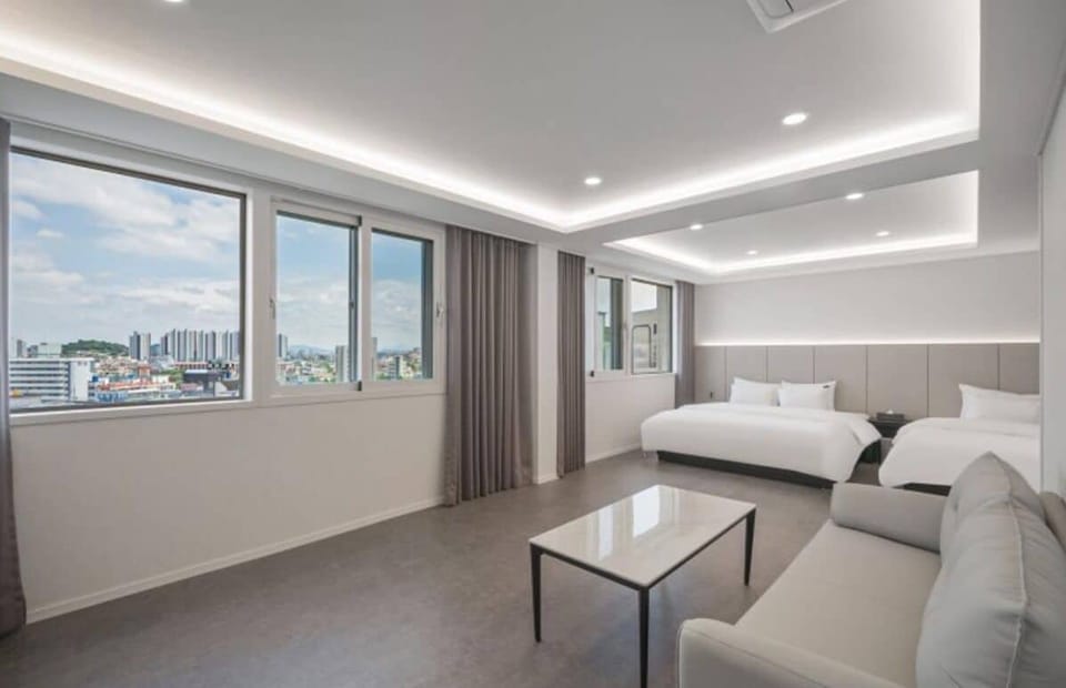 Junior Twin Room, City View | Down comforters, memory foam beds, desk, laptop workspace