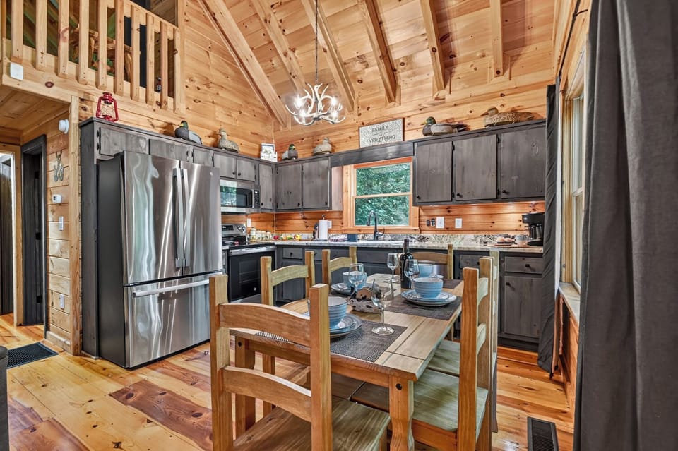 The fully equipped kitchen makes everything from pancake breakfasts to holiday feasts easy at this luxury Blue Ridge vacation rental, just minutes from hiking and Lake Buckhorn