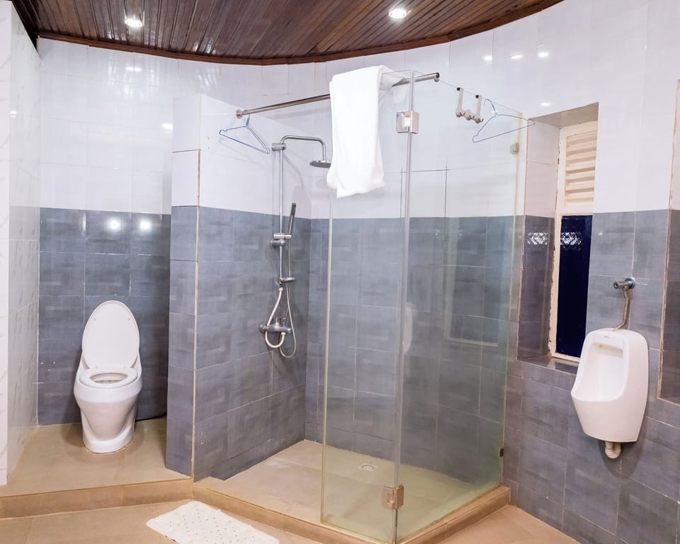 Superior Suite, Balcony, City View | Bathroom | Shower, hair dryer, slippers, towels