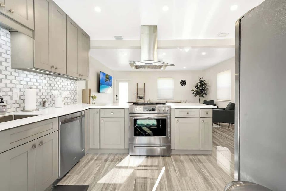 Newly built kitchen with kitchen essentials. Refrigerator, stove, dish washer etc. 