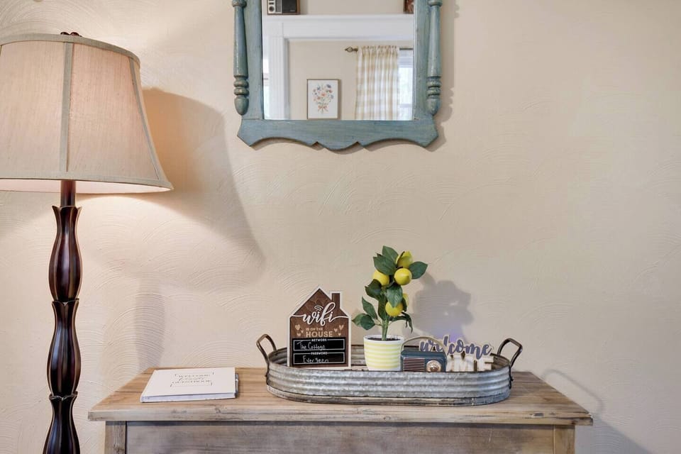 Feel right at home from the moment you arrive with this thoughtfully designed entry space featuring warm lighting, high speed Wi-Fi details, local brochures, and a guest review book. 