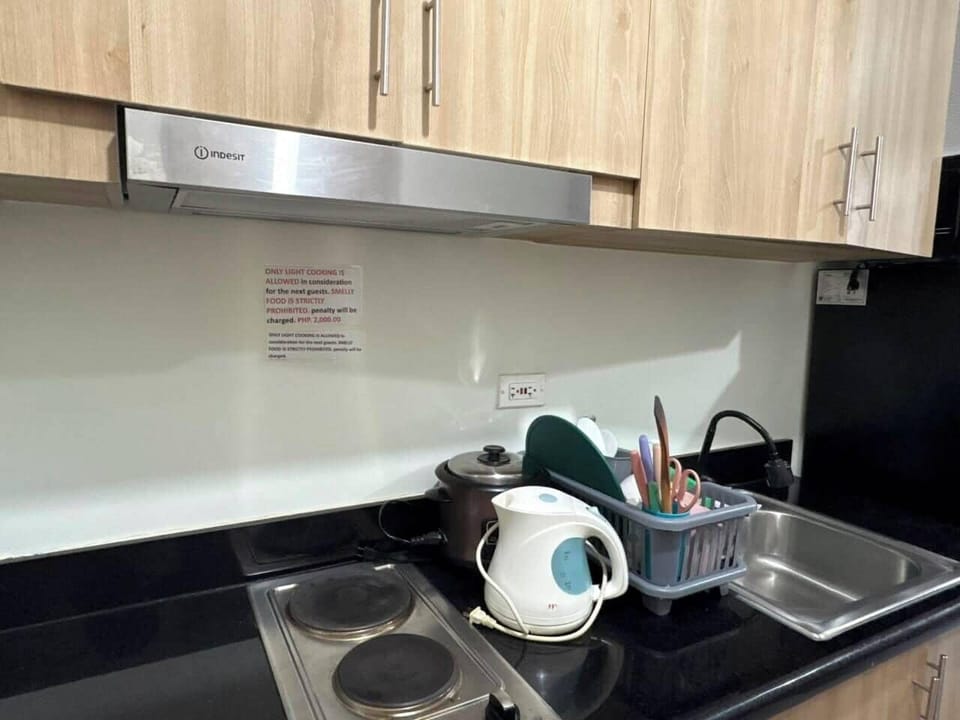 Apartment, 1 Bedroom | Private kitchen | Microwave, stovetop