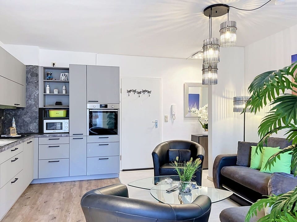 Furniture, Interior Design, Flooring, Ceiling, Chair, Light Fixture, Floor, Apartment, Table, Lighting