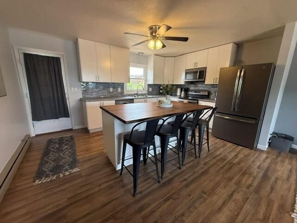Open concept kitchen flows into the living space.