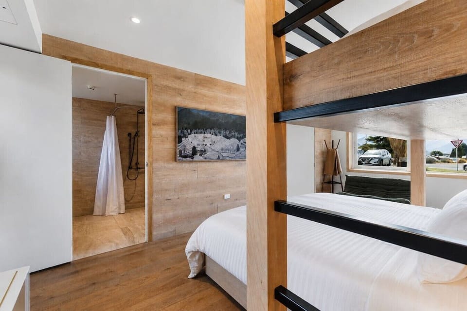 Comfortable studio bedroom with a warm, modern design