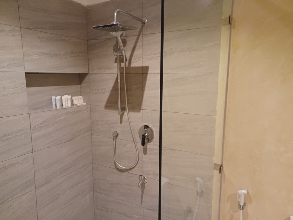 Deluxe Double Room, City View | Bathroom | Free toiletries, slippers, towels, soap