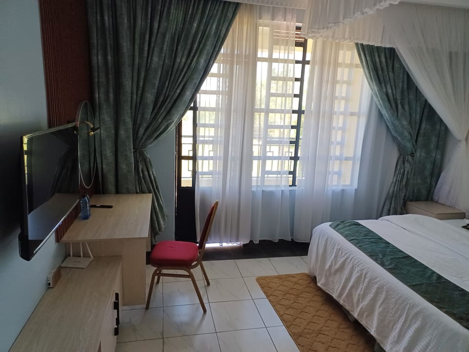 Deluxe Double Room, City View | Desk, laptop workspace, iron/ironing board, WiFi (free)