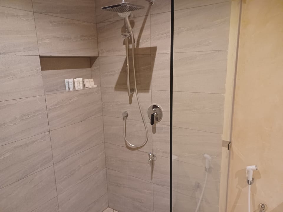 Deluxe Double Room, City View | Bathroom | Free toiletries, slippers, towels, soap