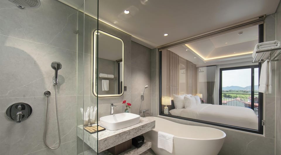 Shower, hydromassage showerhead, designer toiletries, hair dryer