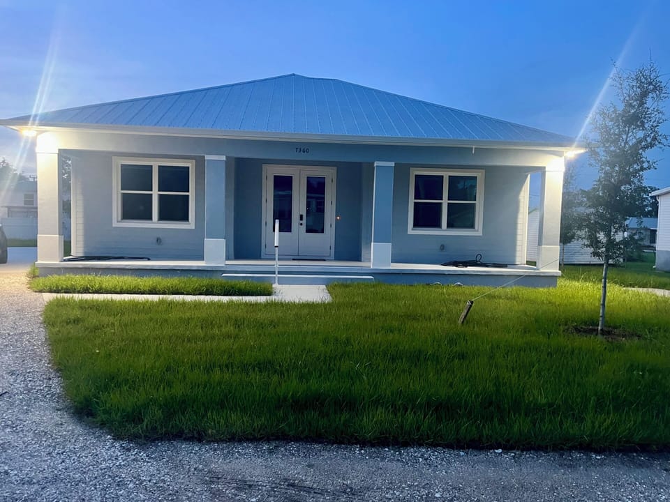 Motion activated lights on house corners.