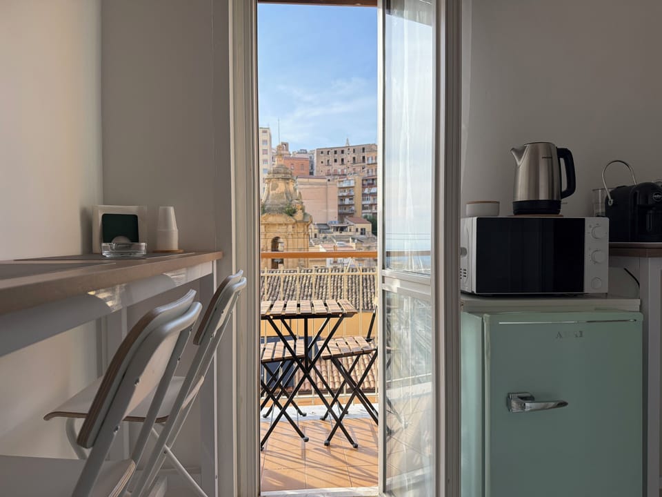 Family Triple Room, Kitchen, Partial Sea View | Balcony view