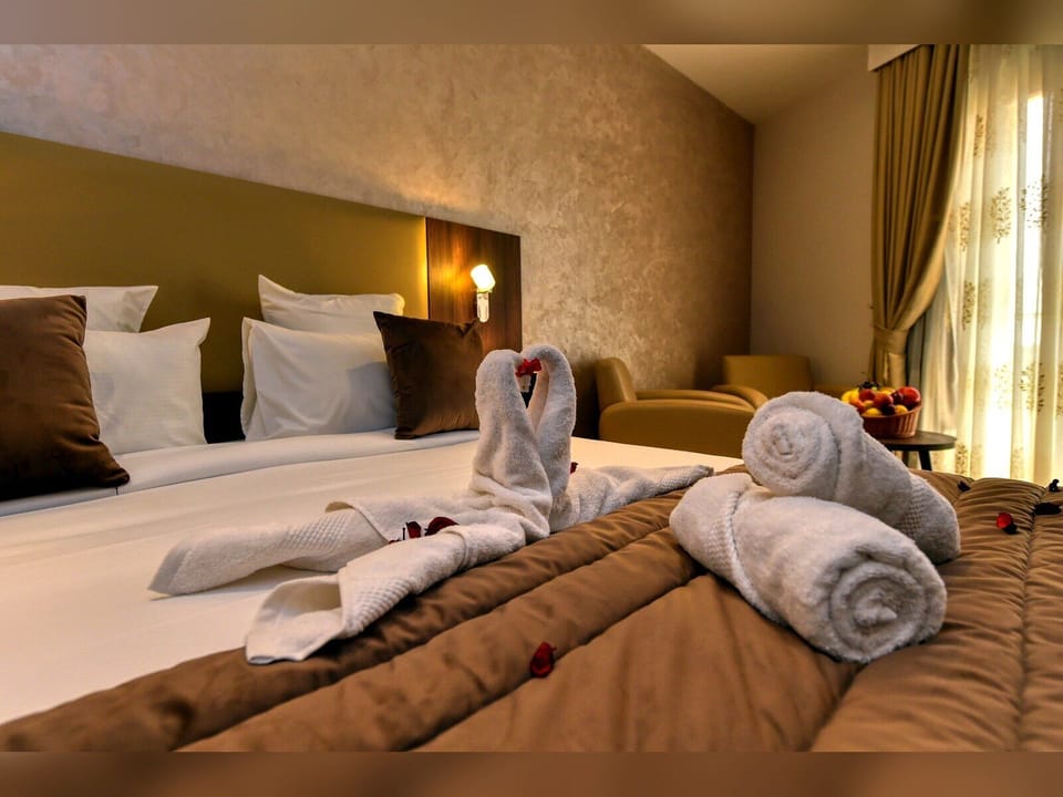 Double or Twin Room | Premium bedding, minibar, in-room safe, blackout drapes