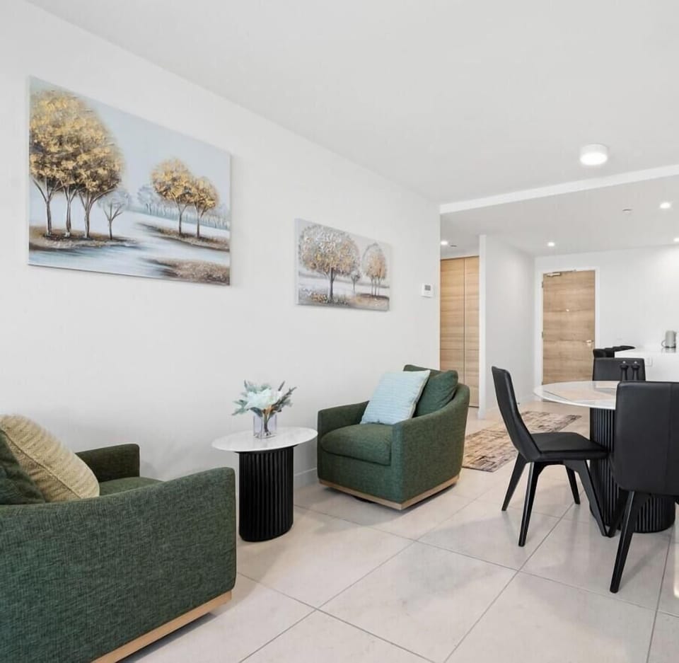 A sophisticated lounge featuring a generous sofa and elegant interiors, thoughtfully designed for comfort, conversation, and quiet relaxation.