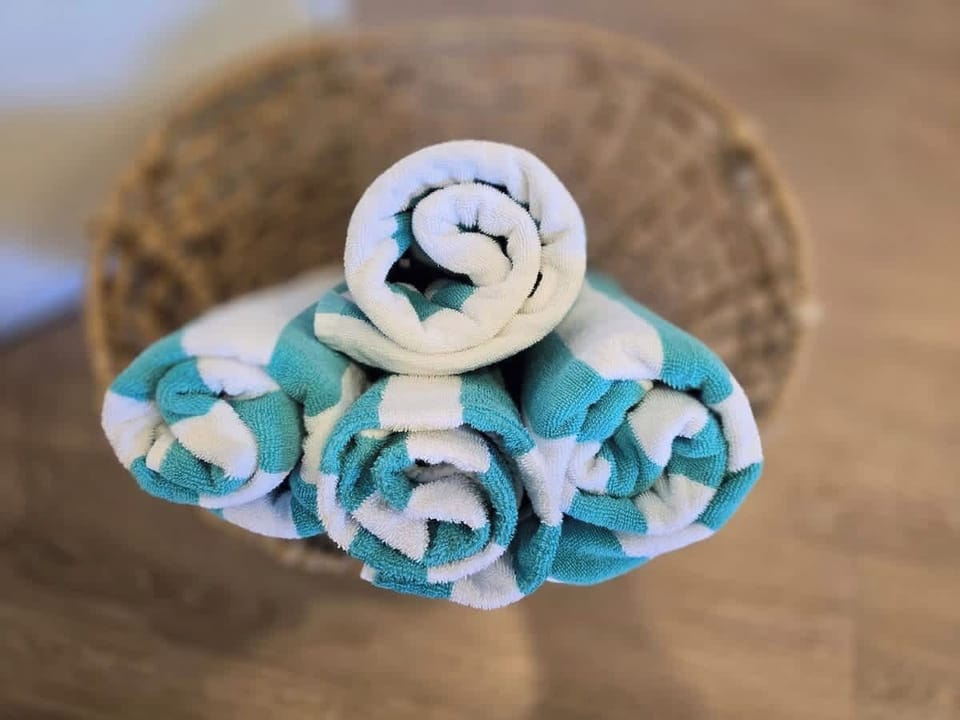 Pool Towels Provided — Grab and Go, the Rooftop Awaits
