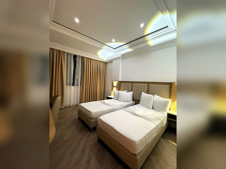 Double or Twin Room | In-room safe, iron/ironing board, WiFi (free)