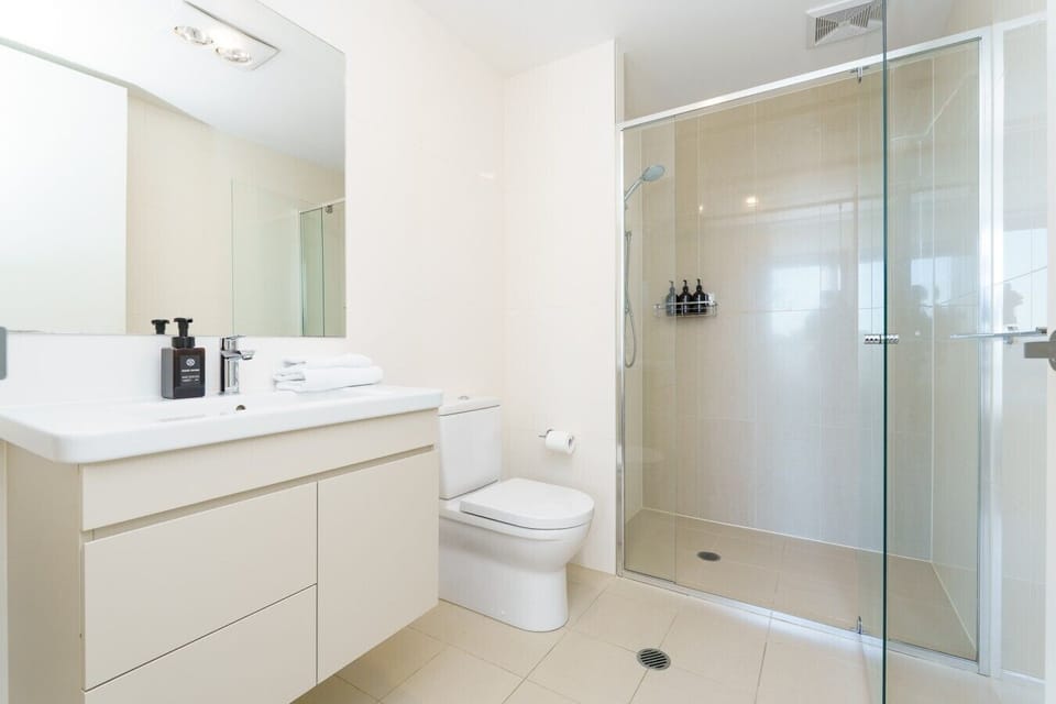 The sleek bathroom combines style and practicality, with everything you need for a comfortable stay.