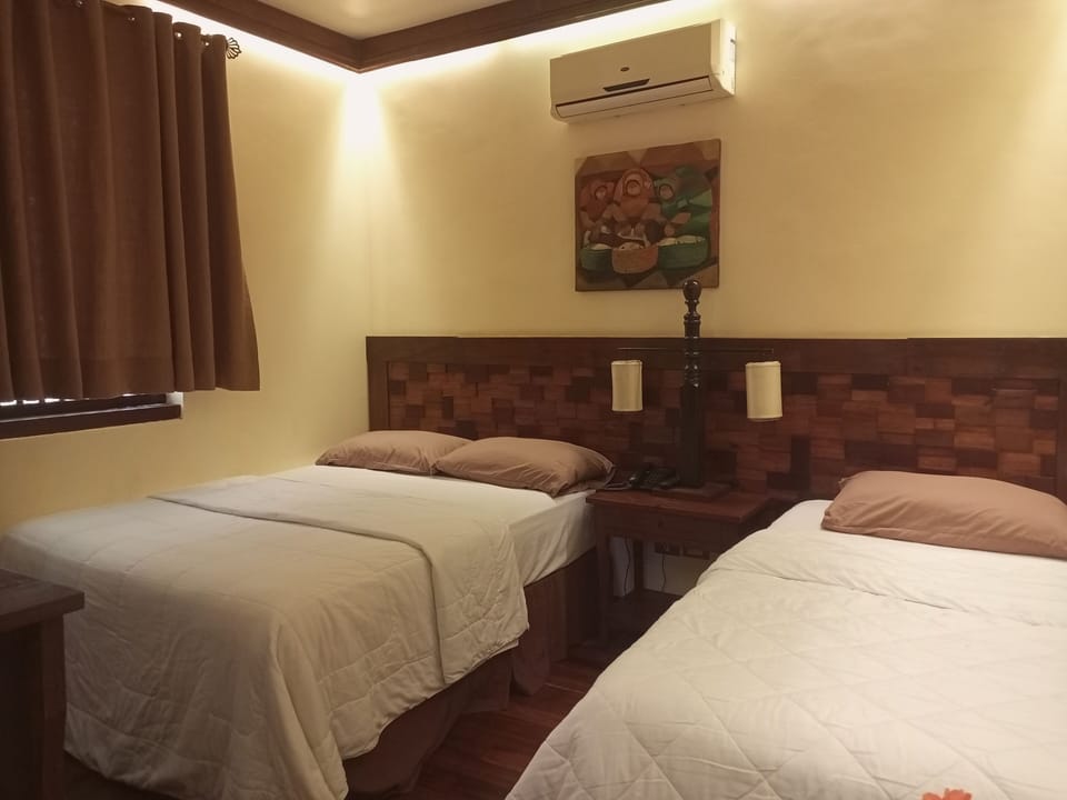Deluxe Triple Room, Patio | Desk, laptop workspace, WiFi (free)