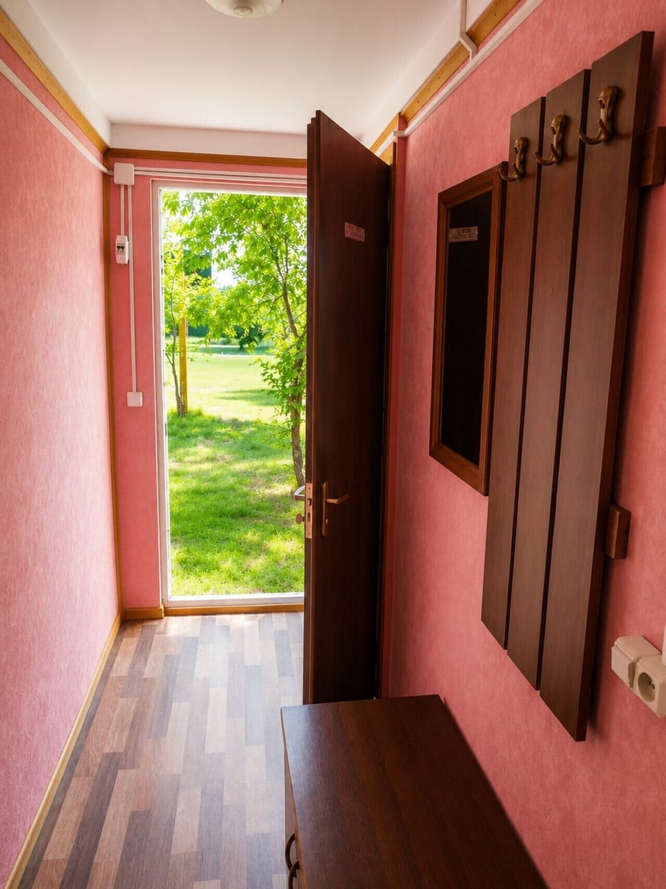 Cottage entrance with a private garden view