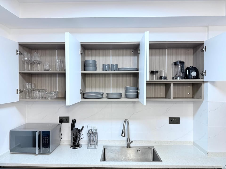 Classic Apartment, Balcony, City View | Private kitchen | Coffee/tea maker, full-size fridge, microwave, oven