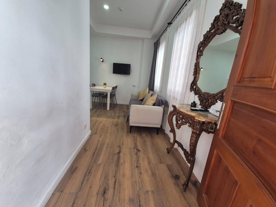 Condo, 2 Bedrooms | Living area | 40-cm TV with satellite channels, streaming services