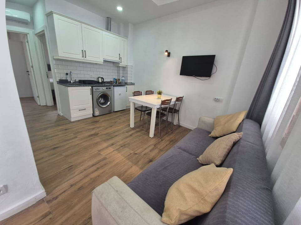 Condo, 2 Bedrooms | Living area | 40-cm TV with satellite channels, streaming services
