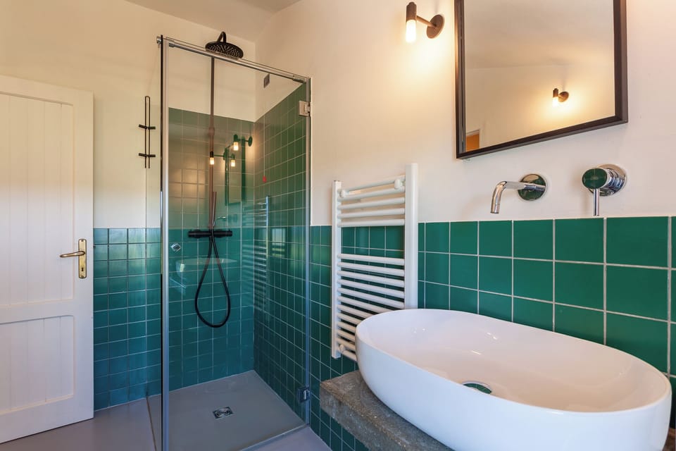 Double Room, Pool View | Bathroom | Shower, rainfall showerhead, hair dryer, slippers