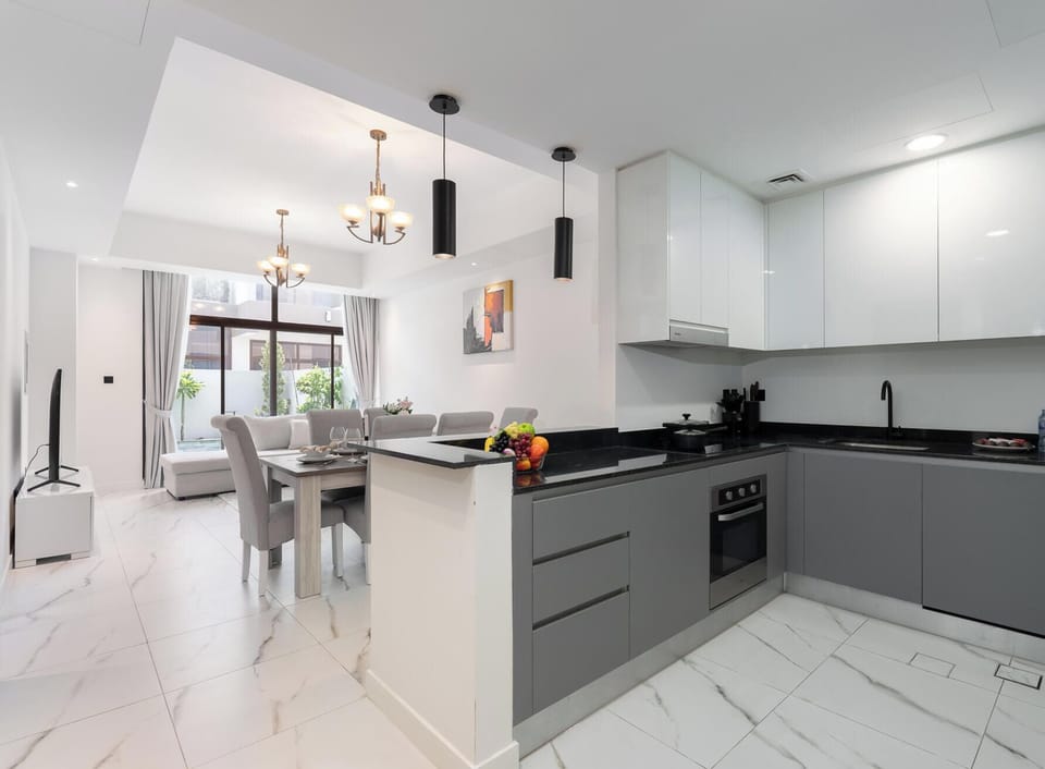 Family Villa, Garden View | Private kitchen | Electric kettle, toaster, freezer, dining table