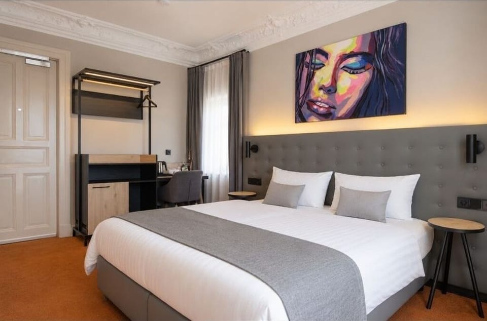 Standard Double Room, Courtyard View | Minibar (free items), desk, laptop workspace, soundproofing