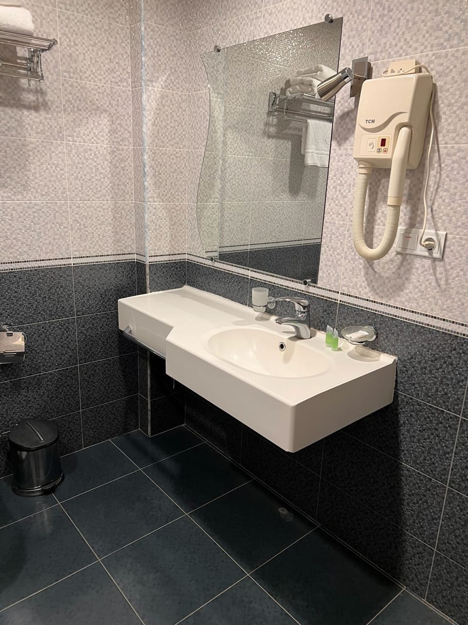Hair dryer, slippers, towels, soap