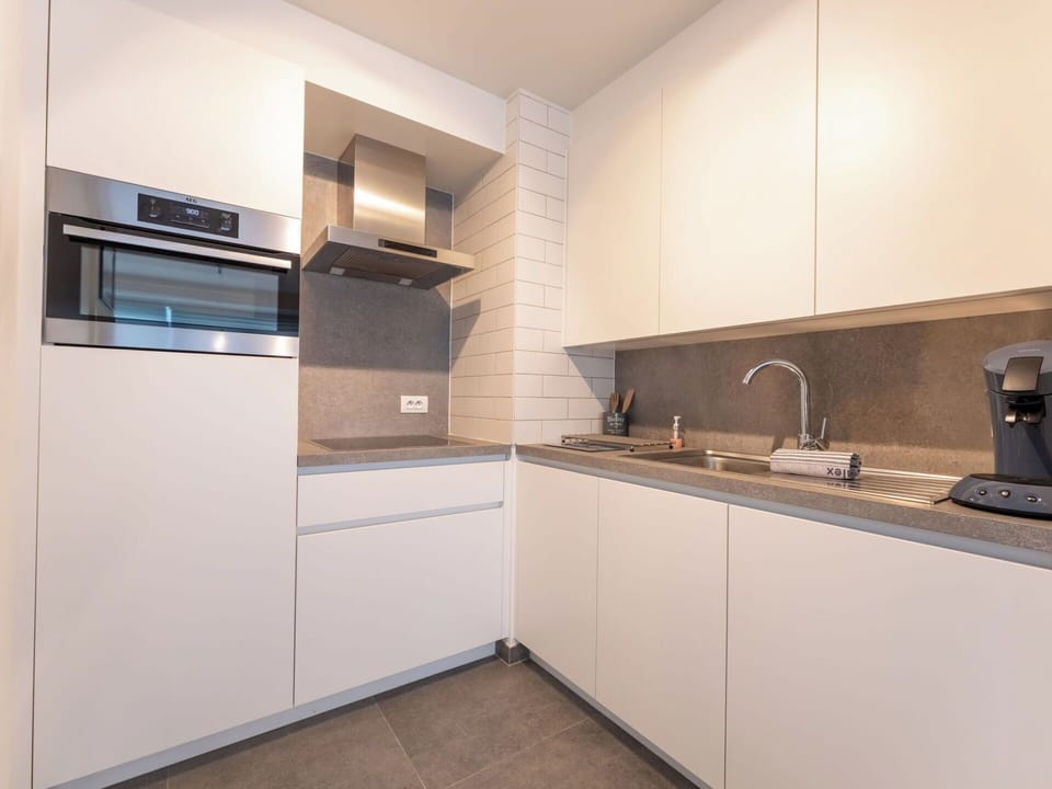 Kitchen, Countertop, Interior Design, Flooring, Kitchen Appliance, Wood, Cabinetry, Major Appliance, Ceiling, Floor
