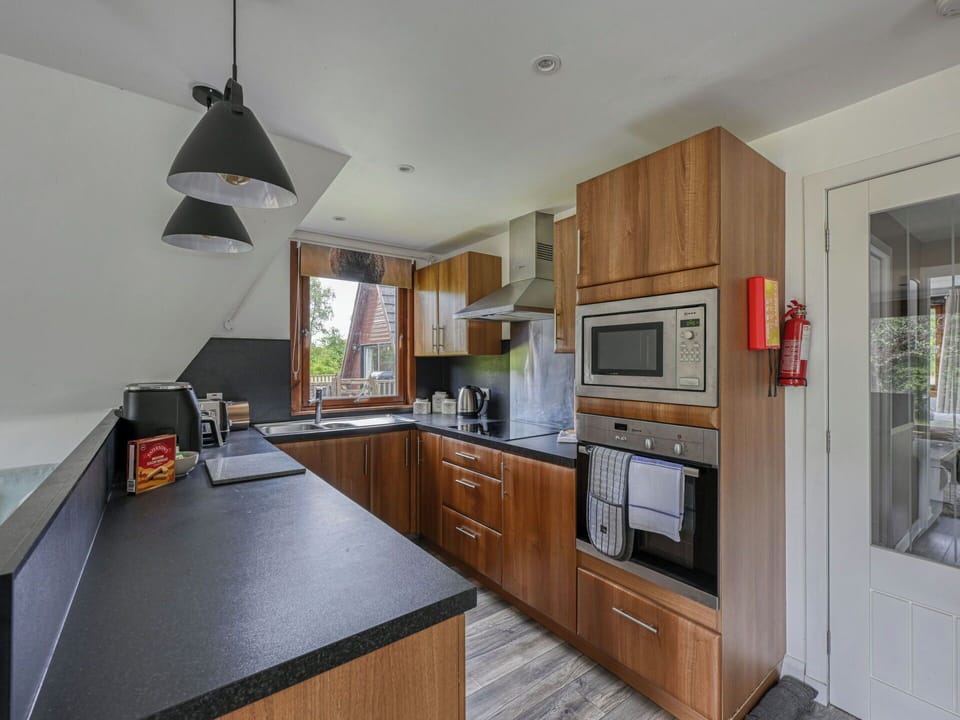 Kitchen, Countertop, Interior Design, Wood, Flooring, Furniture, Kitchen Appliance, Major Appliance, Cabinetry, Floor