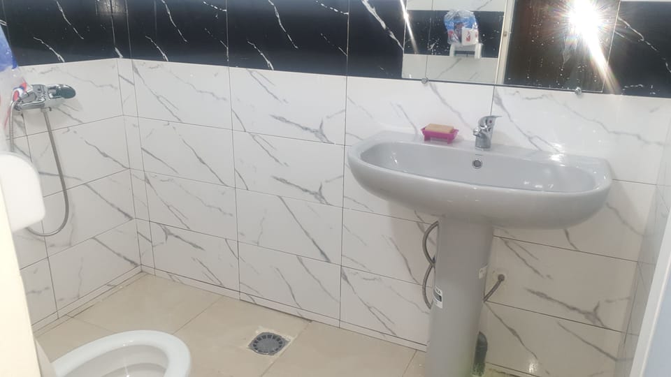 Bathroom | Shower, slippers, towels, soap