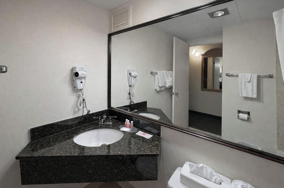 Room, 2 Queen Beds, Non Smoking (Refrigerator, Microwave) | Bathroom | Combined shower/tub, towels