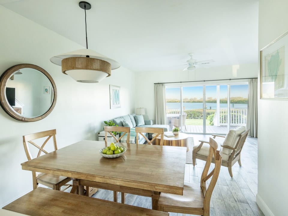 Savor moments spent in this vibrant dining space, where laughter and delicious meals come together against a backdrop of stunning waterfront views.