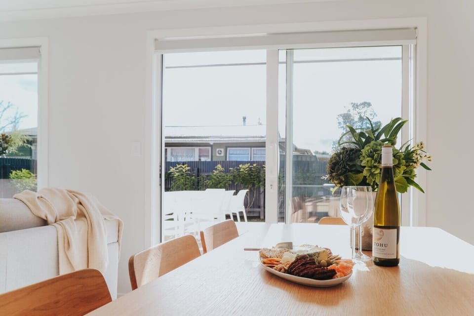 Sunny dining space with indoor/outdoor flow