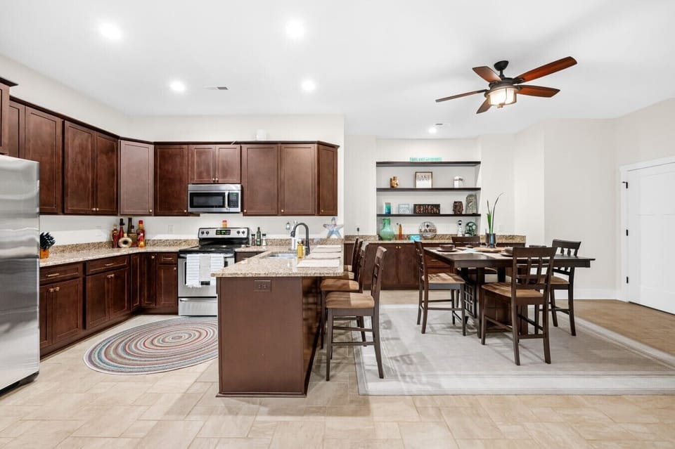 Kitchen | Stainless Steel Appliances | Dining Table
