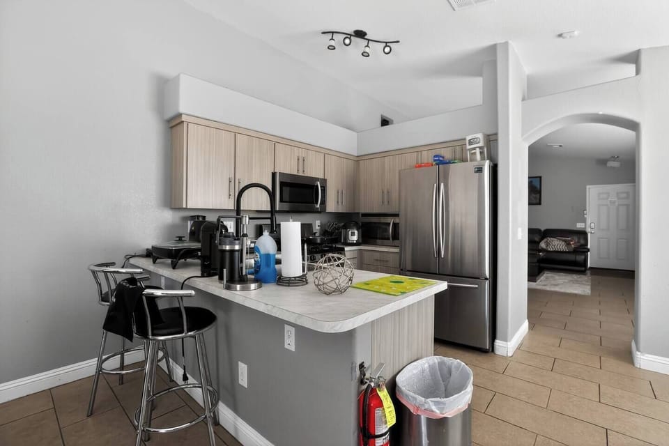 From morning coffee to family dinners, this inviting kitchen is the heart of the home.