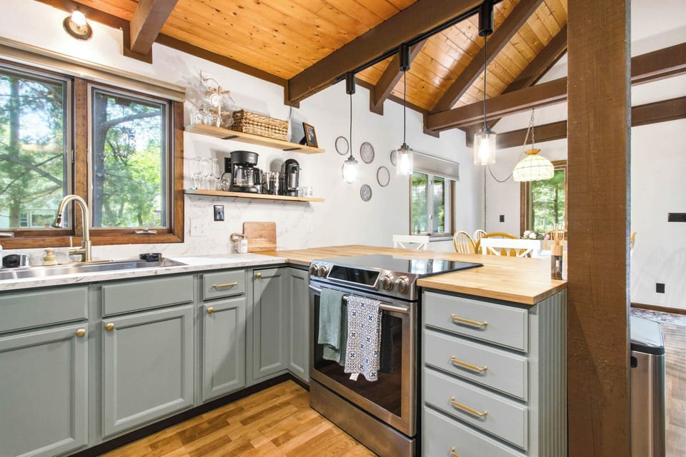 Gather, cook, and linger in a bright, stylish kitchen designed for easy meals and cozy cabin moments.