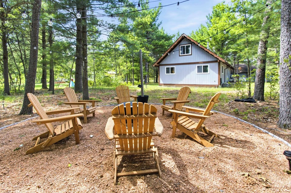Gather under the string lights in a peaceful wooded retreat made for fireside conversations, fresh air, and relaxed evenings together.