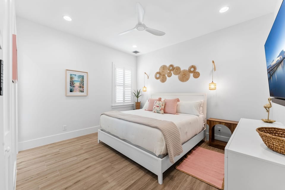 Guest bedroom 2 features a plush king bed and smart TV