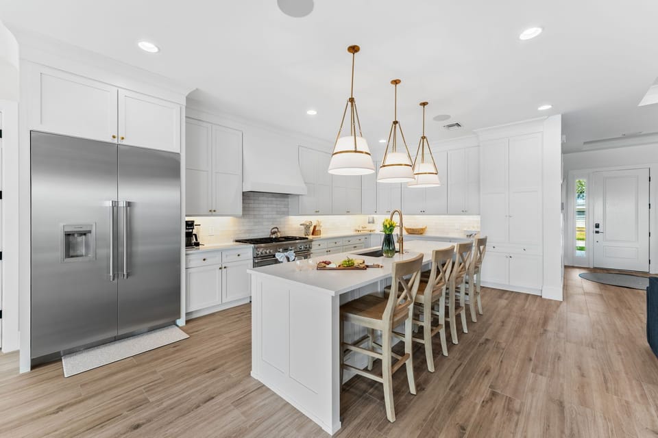 Sleek & modern kitchen with breakfast bar that seats four