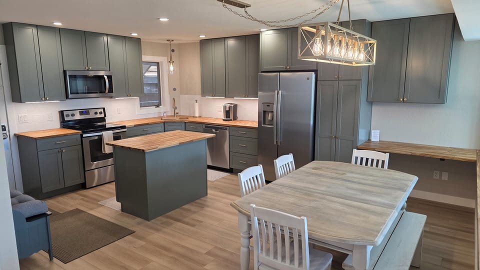 Kitchen and Dining areas with ample lighting