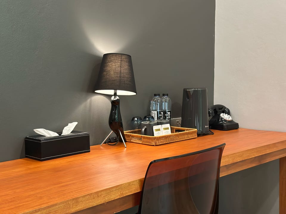 Deluxe Suite, Hill View | In-room safe, desk, WiFi (free), bed sheets