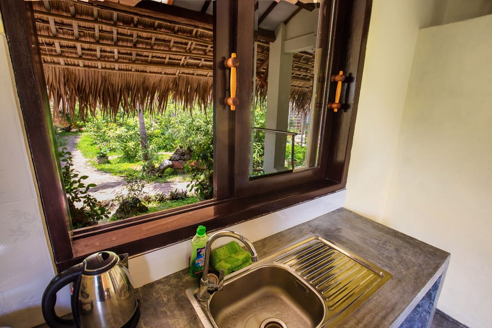 Lotus Room | Private kitchenette | Fridge, electric kettle