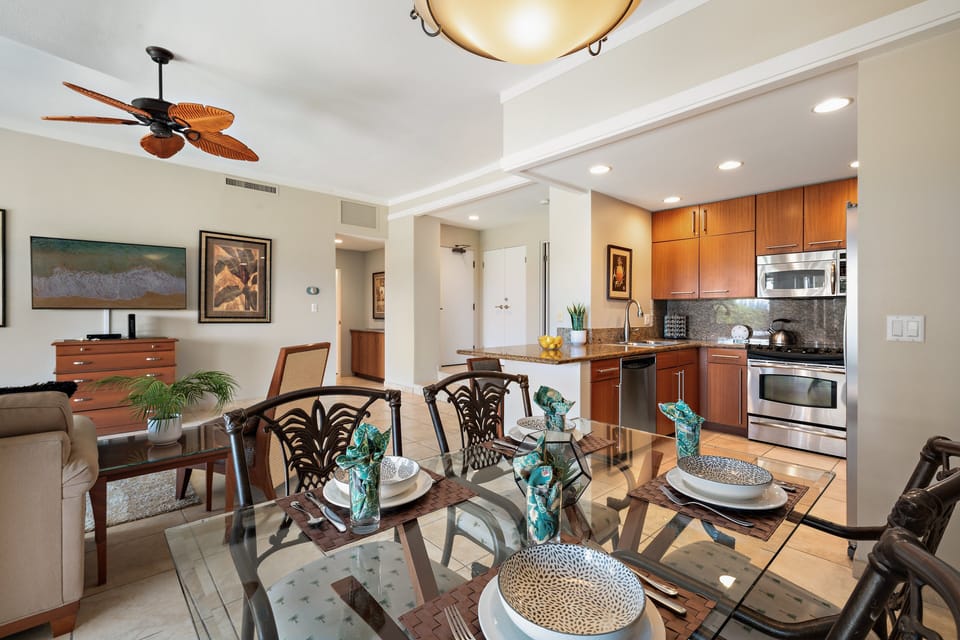 Spacious open-concept design connecting the kitchen, dining, and living areas.