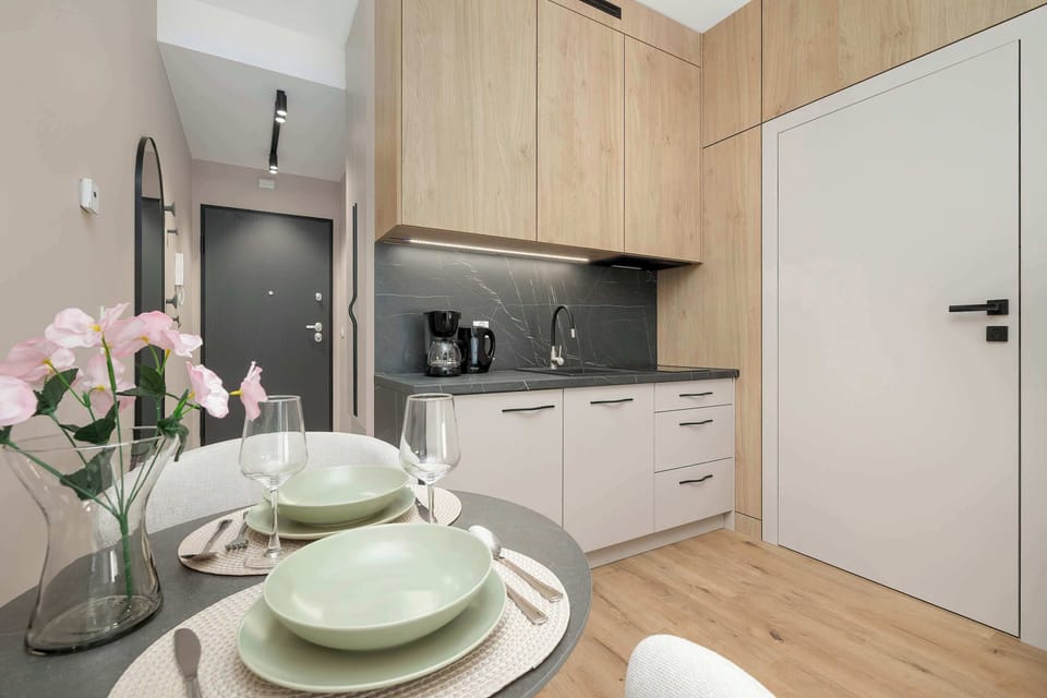 The fully equipped kitchenette includes everything you need for a home-cooked meal.